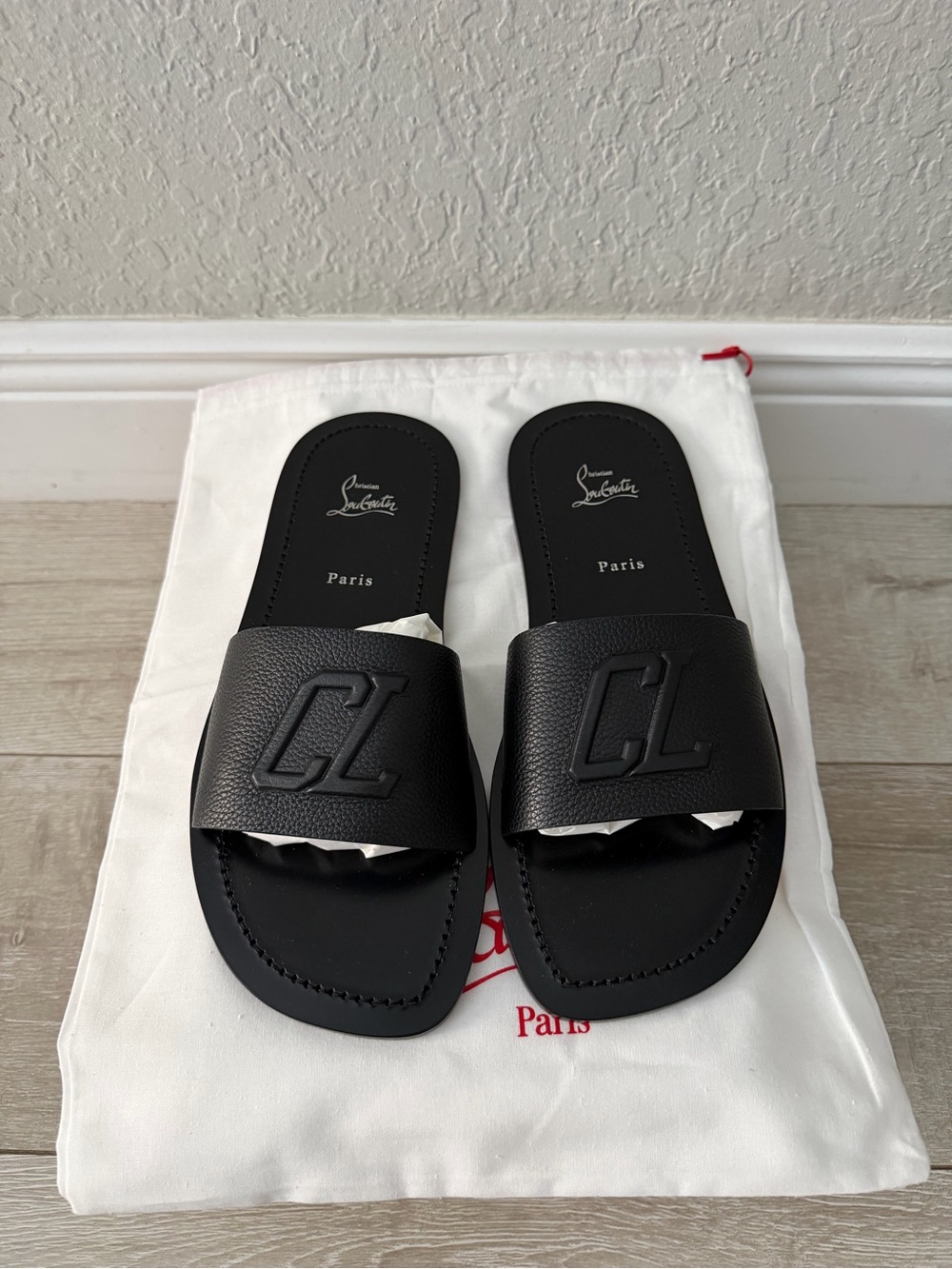 Christian Louboutin Black leather Embossed CL Slide Sandals men 44